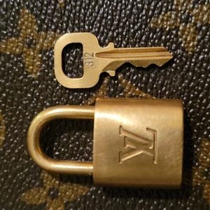 Authentic Louis Vuitton brass lock and key set #312
